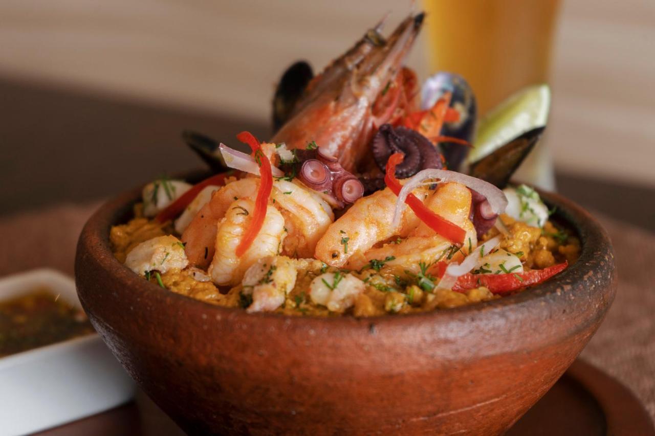 Holiday Inn - Quito Airport By Ihg Tababela Exterior photo Seafood paella